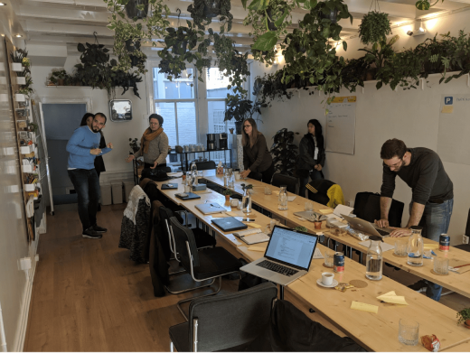 The team in a co-working space we rented our to run our sprint